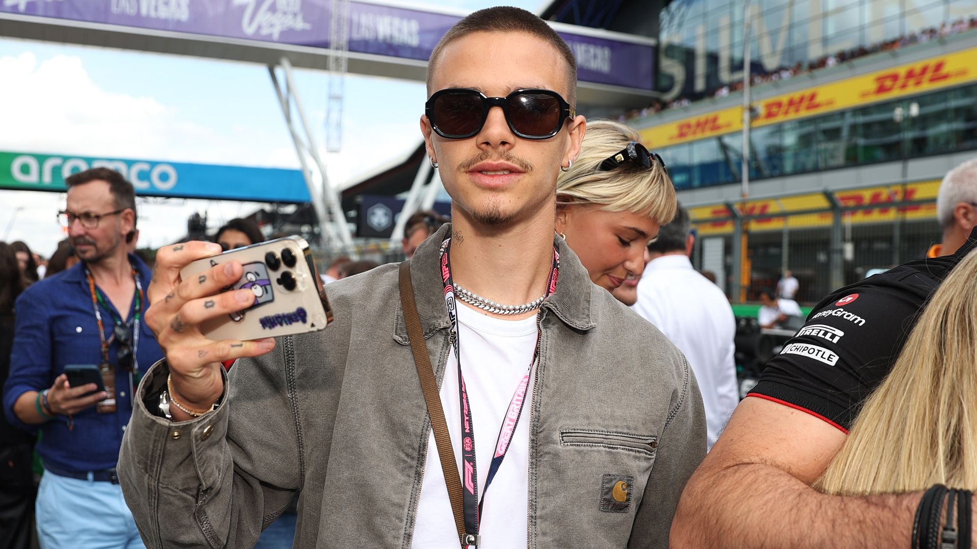 don-t-look-back-in-anger-romeo-beckham-spotted-at-oasis-gig-with-man